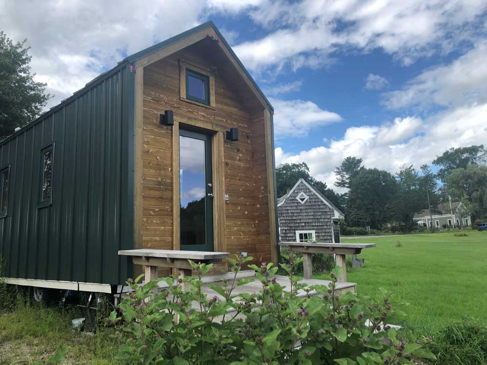 Another view of the front door of the Contemporary Cottage custom tiny home