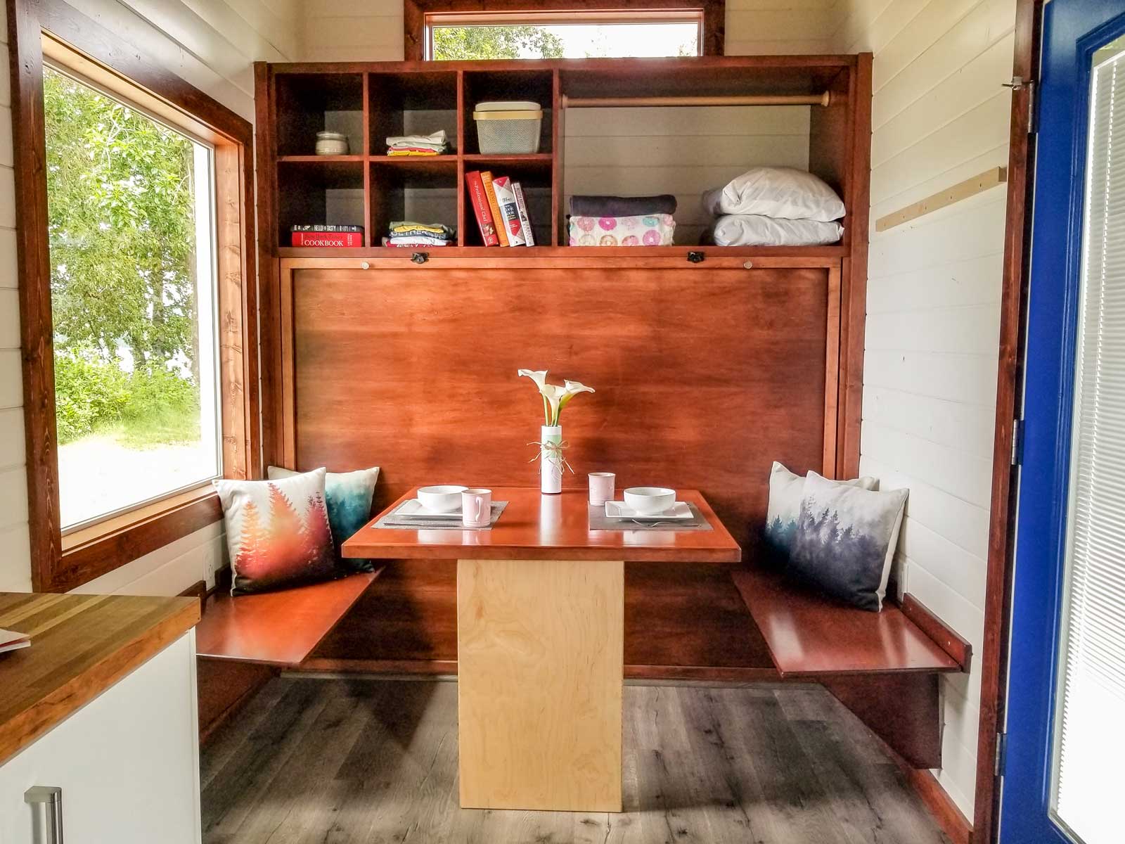 Dining room of cozy cottage custom tiny home