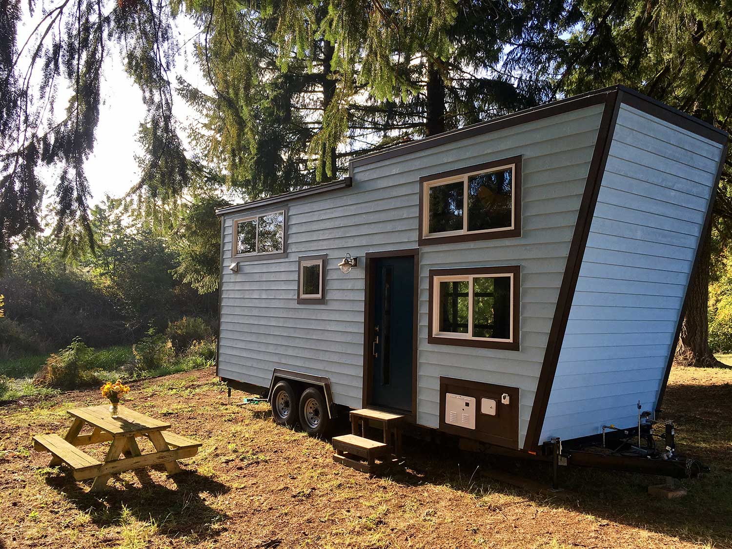 Outside of the Tiny Adventure Home in a forest