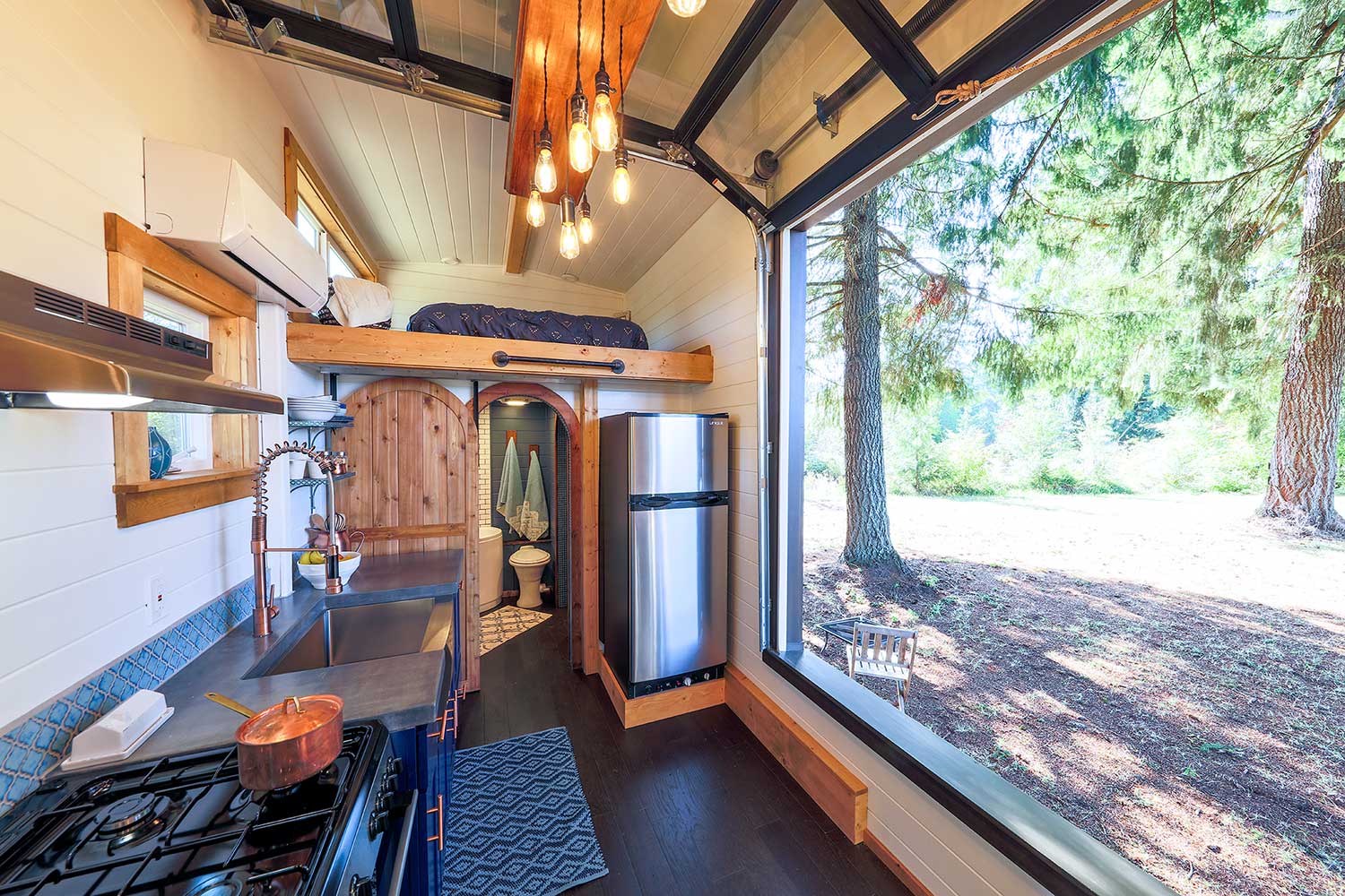 Sliding garage door on our the Adventure custom tiny home