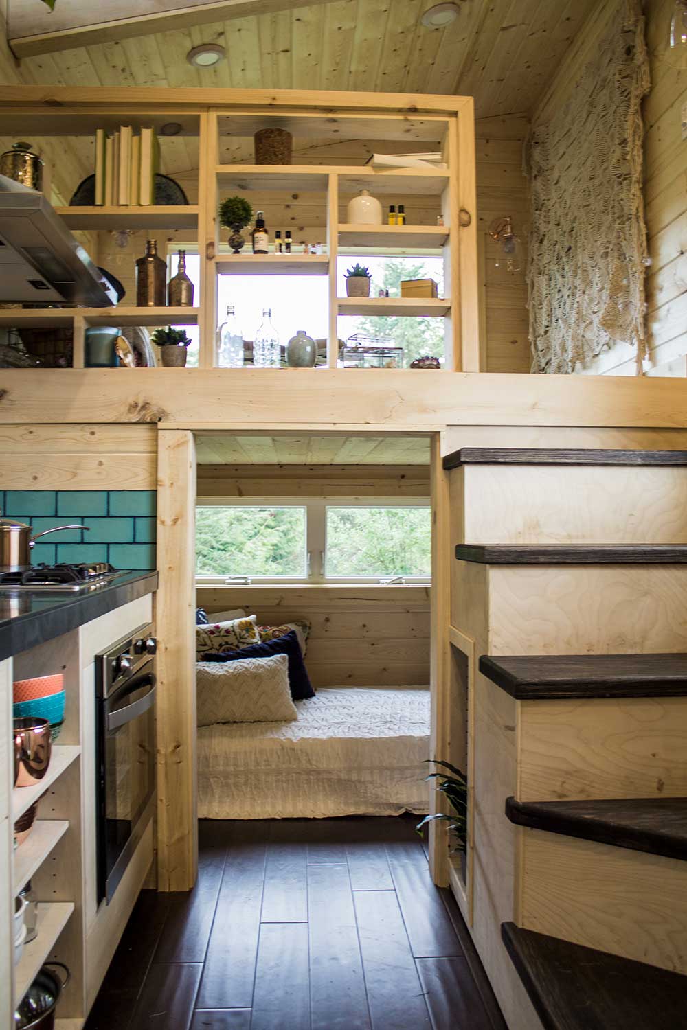 Loft, stairs and bedroom in a beautiful custom tiny home