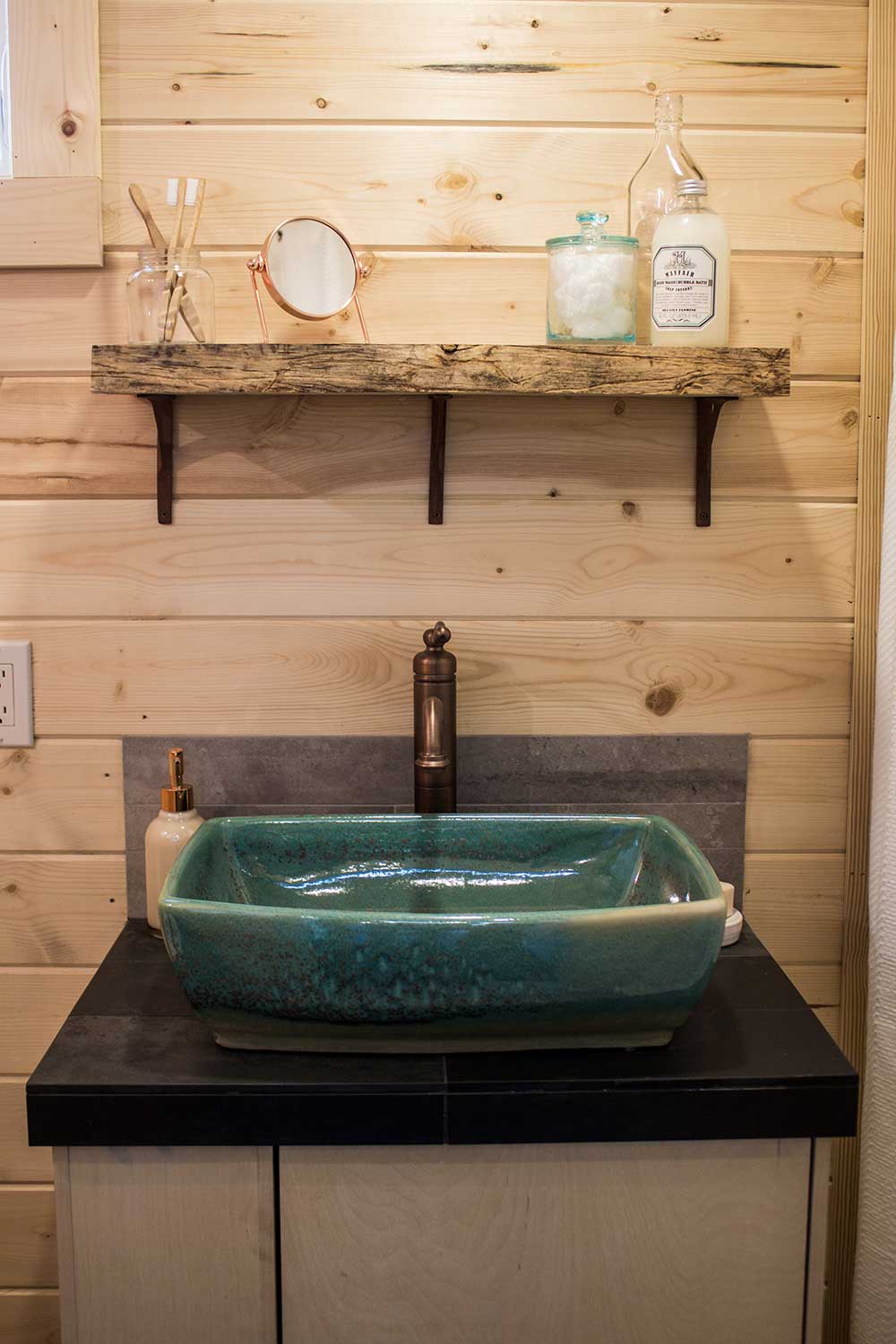 Custom bathroom sink in the Apothecary Tiny House