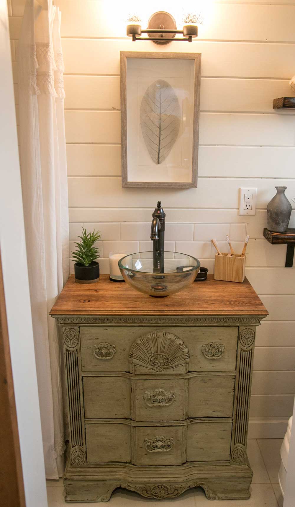 Beautiful bathroom sink in The Archway custom tiny house