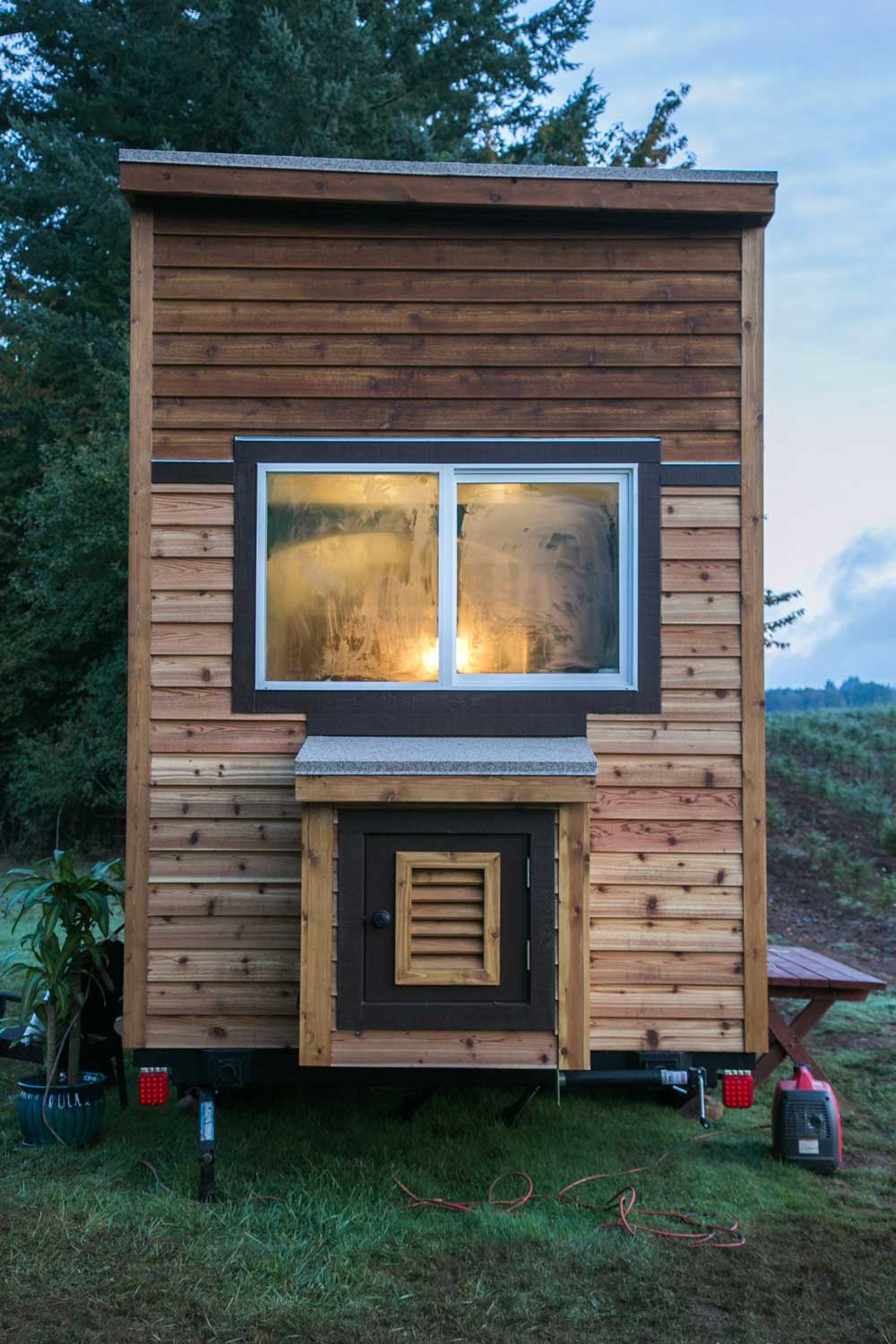 Rear window from the outside in The Archway custom tiny house