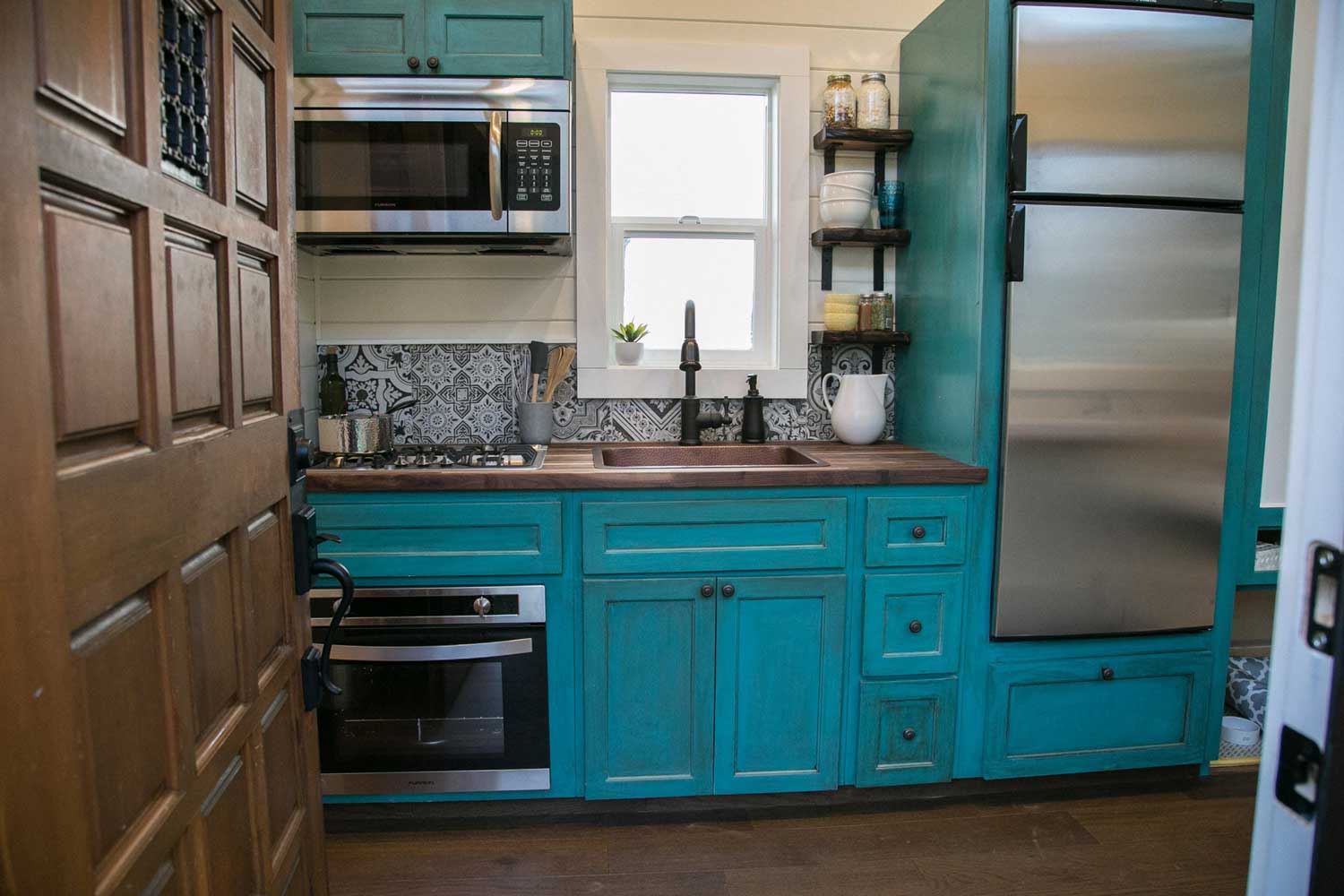 Charming kitchen in The Archway custom tiny house