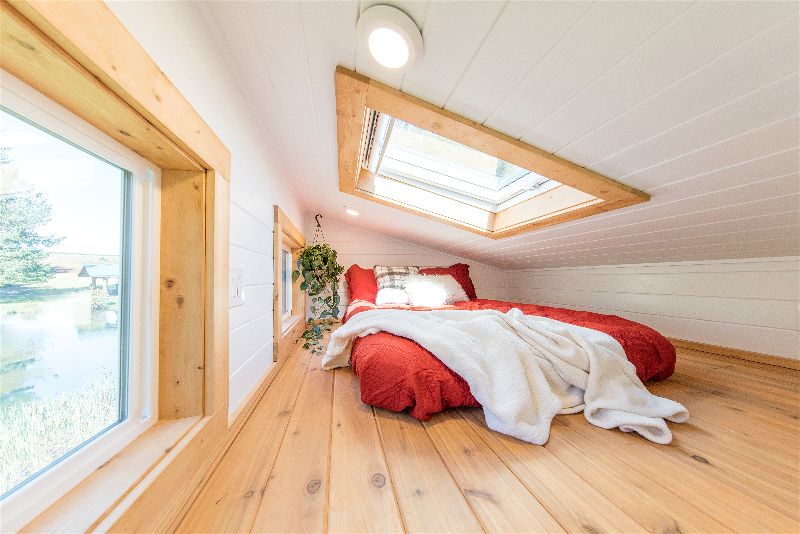 Loft bedroom in the Artists' Retreat custom tiny house