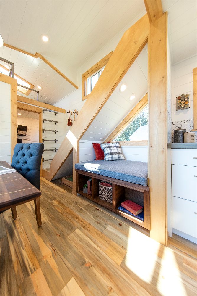 Under-stair couch in the Artists' Retreat custom tiny house