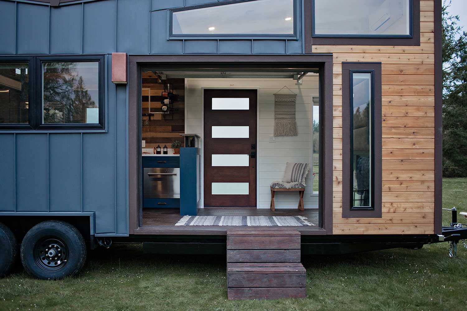 Open garage door looking into Breezeway custom tiny home