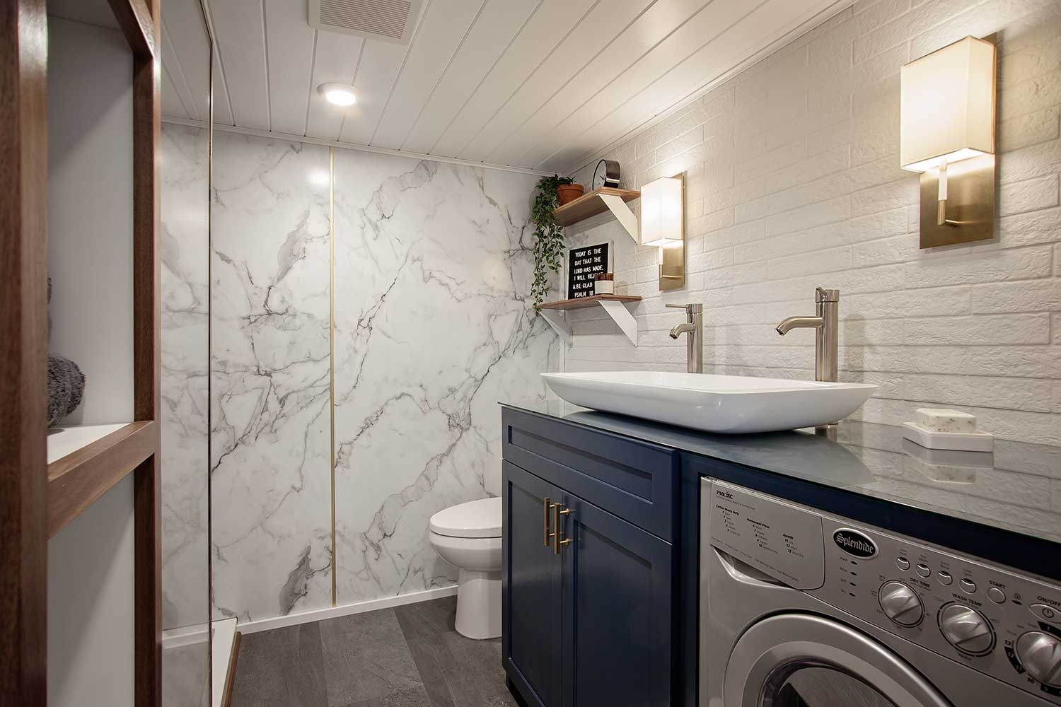 Marble walled bathroom in the Breezeway custom tiny home