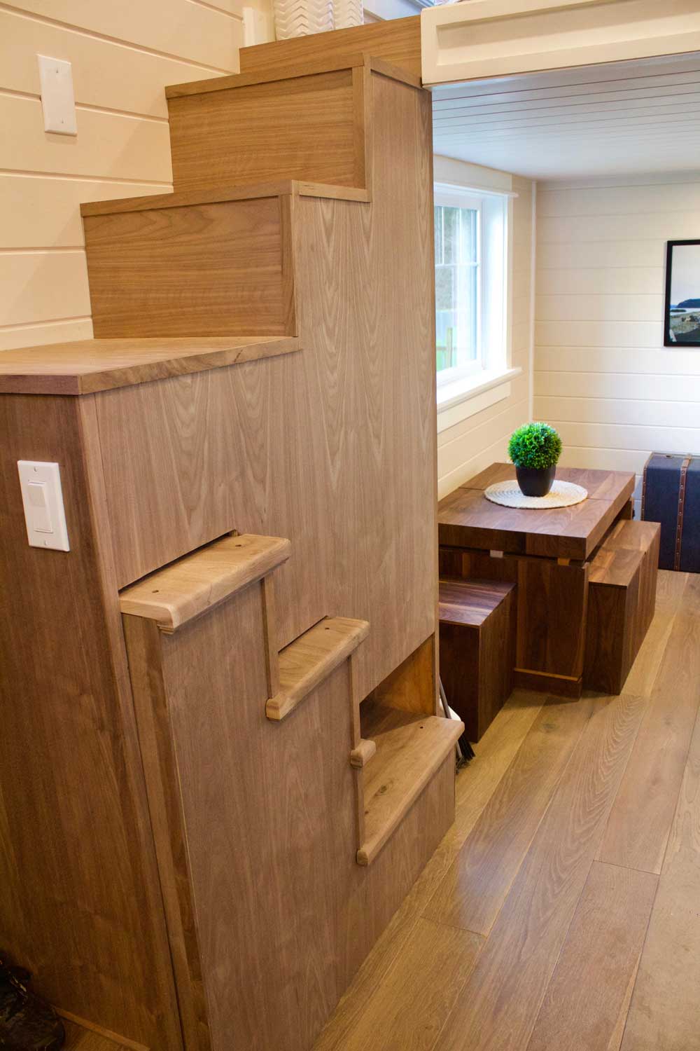 Collapsable stairs to a loft in the Tiny Craftsman Home