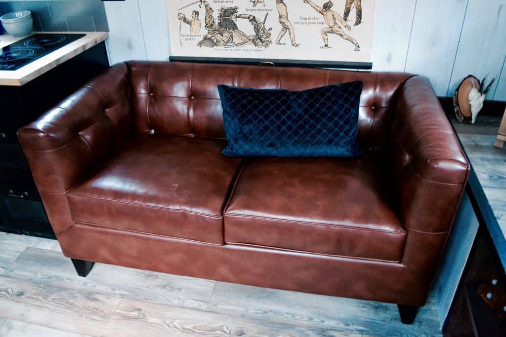 Sofa in The Huntsman Cabin custom tiny home