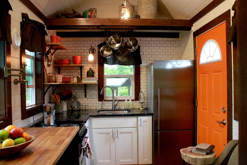 Interior of The Kalani custom tiny home showing the kitchen