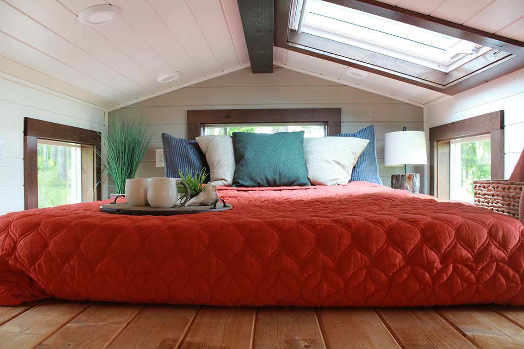 Sleeping loft in The Kalani custom tiny home