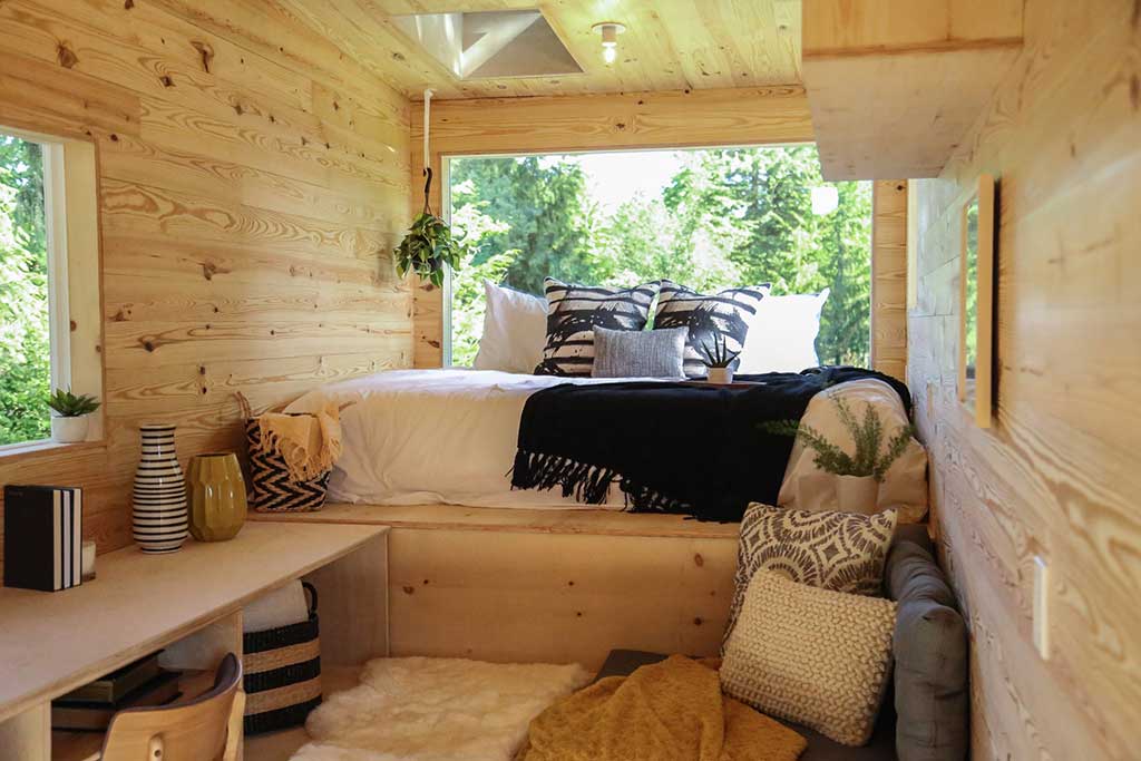 Bed in odern Shou Sugi Ban custom tiny home