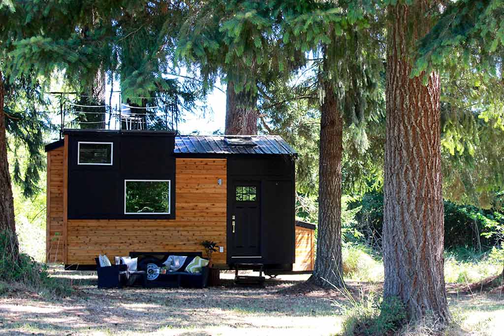 The Modern Tiny Home in Colorado set in a forest