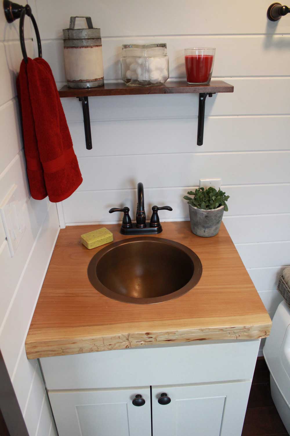 The Retro Southern Charm custom tiny house's bathroom sink