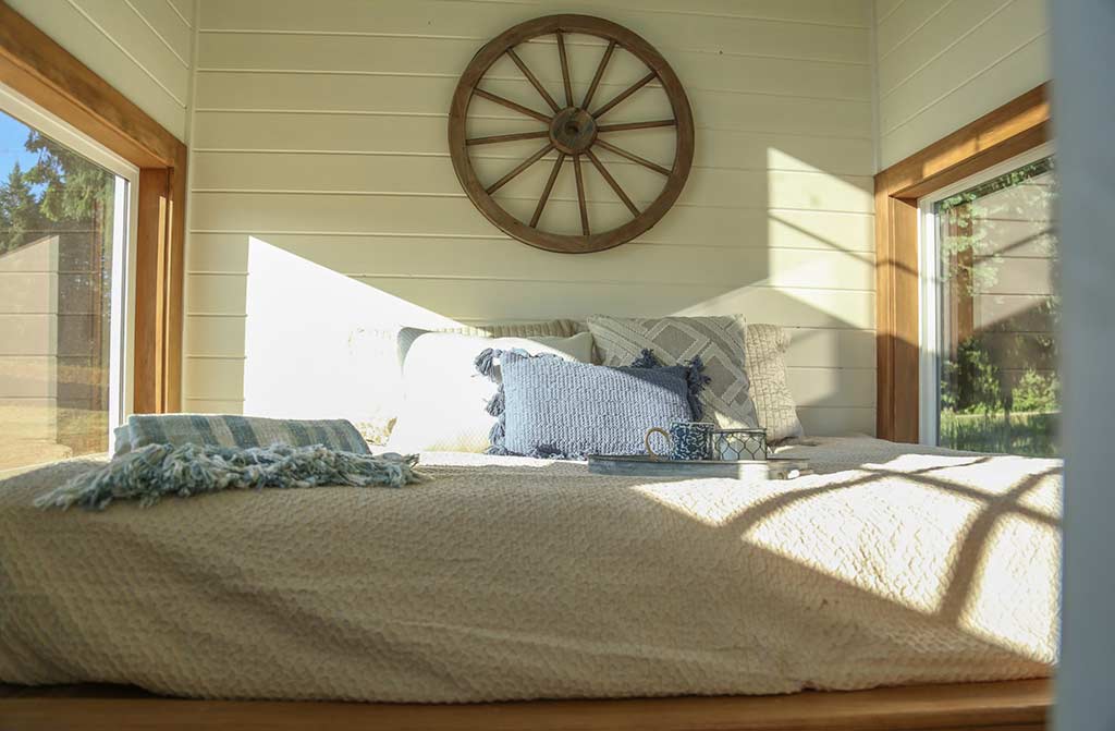 Sleeping loft in the Rustic Farmhouse custom tiny home