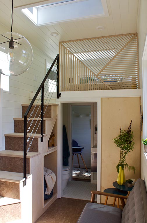 Stairway to loft in the Scandinavian Simplicity custom tiny home