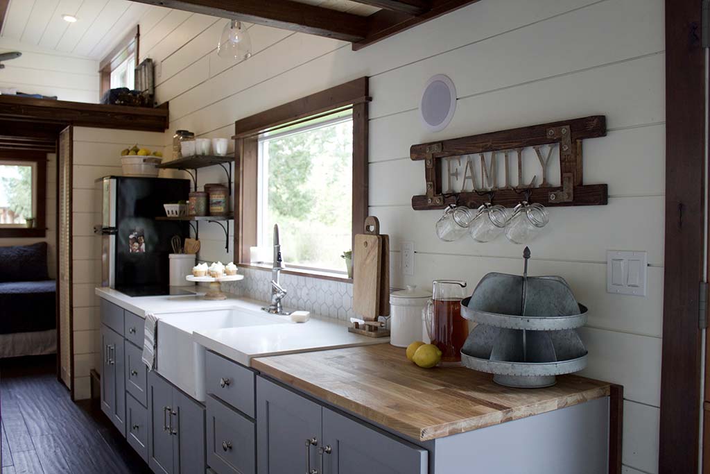 Rustic but elegant kitchen in The Tailgating Farmhouse custom tiny home