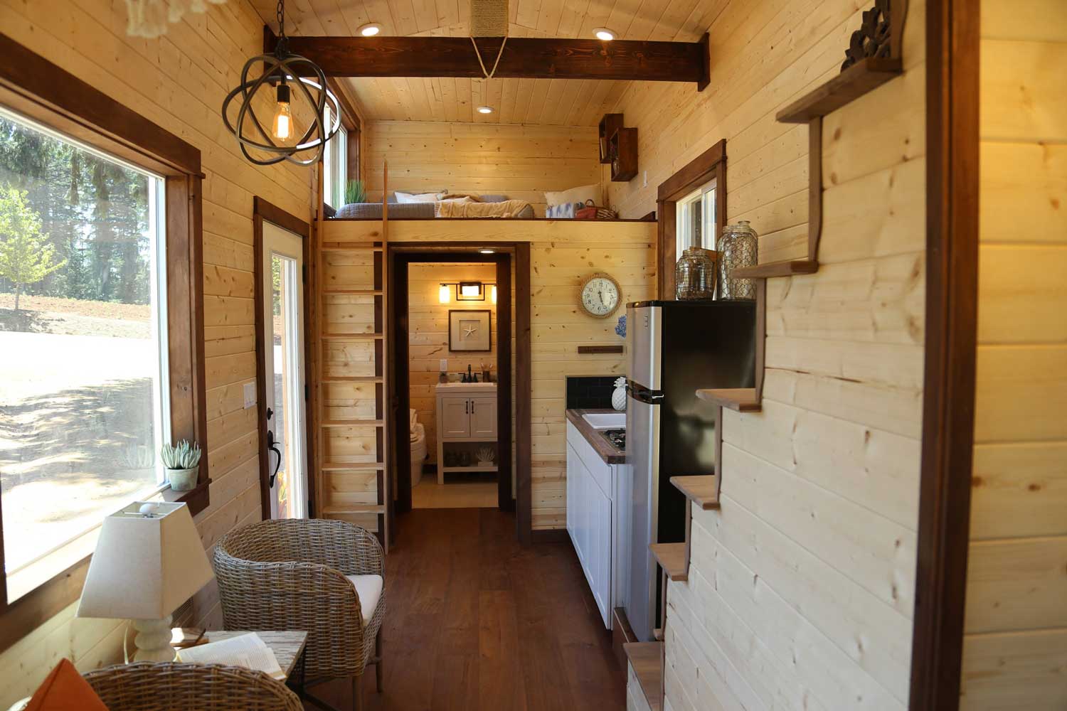 Charming rustic interior of the Tropical Getaway custom tiny house
