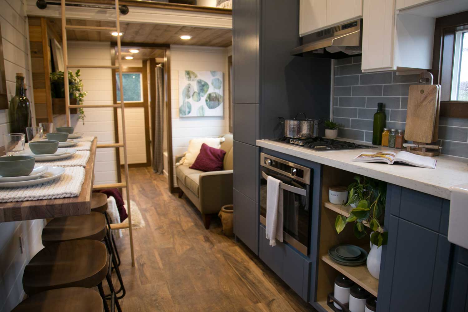 Tiny Travelling Dream Home tiny house's kitchen and living room