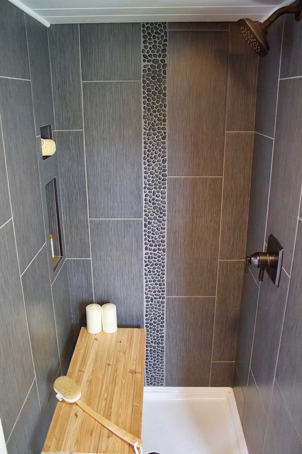Tile shower in the Modern Mountain House custom tiny house