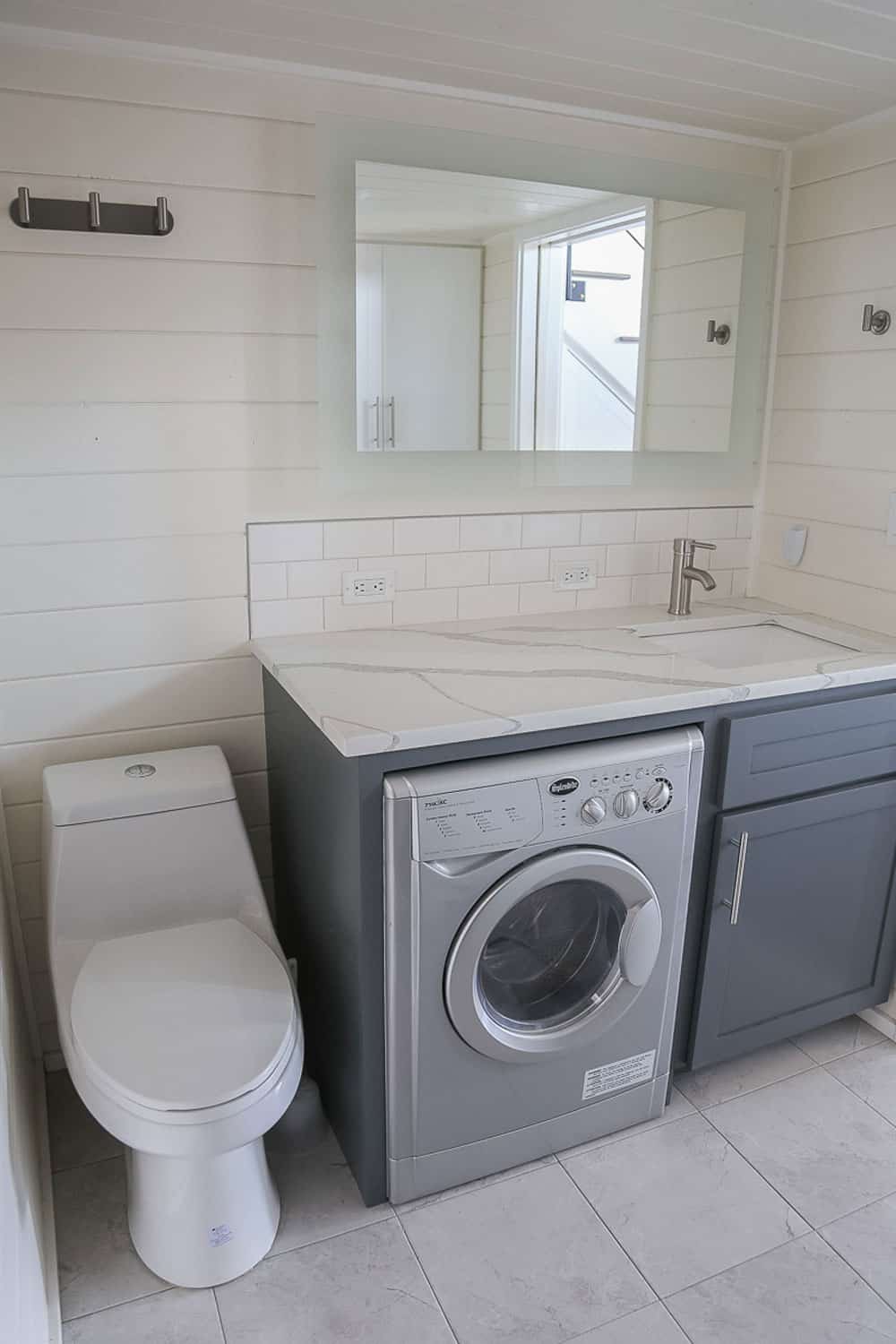 Bathroom / washer combo in the Contempo custom tiny home