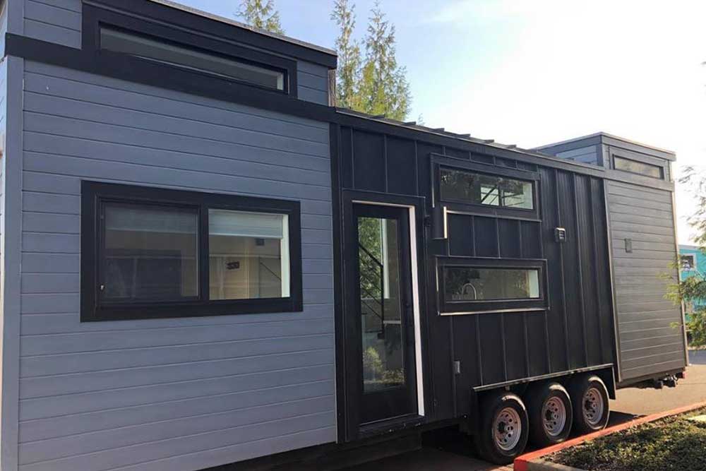 View of the outside of the Contempo custom tiny home by TIny Heirloom