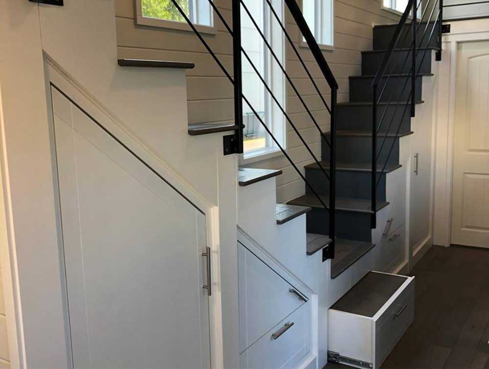Contempo custom tiny home's double storage stairs
