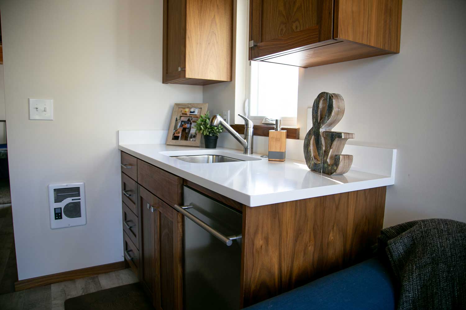 Sink in the custom tiny house Log Cabin