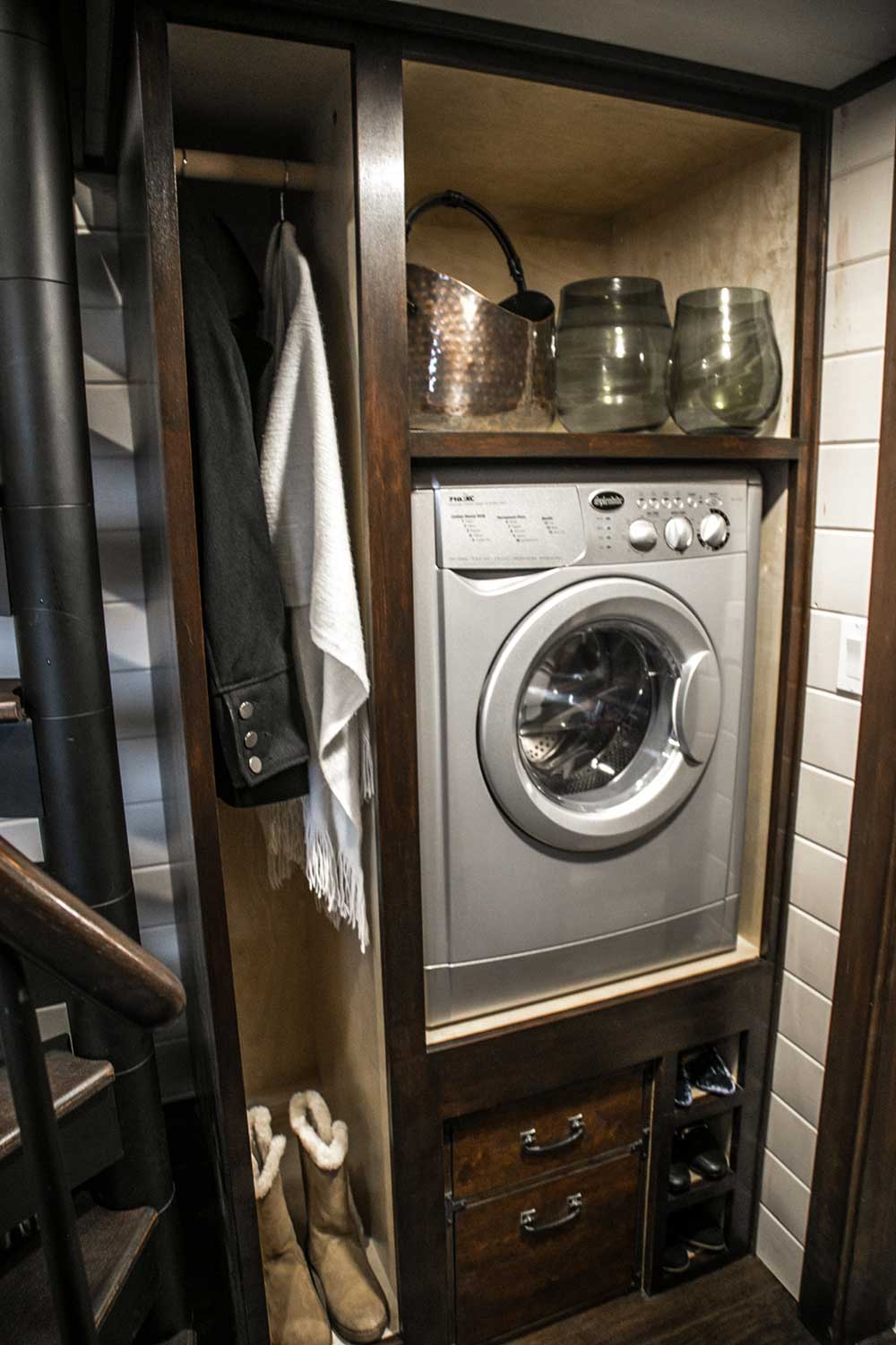 Washing machine in the Tudor custom tiny home