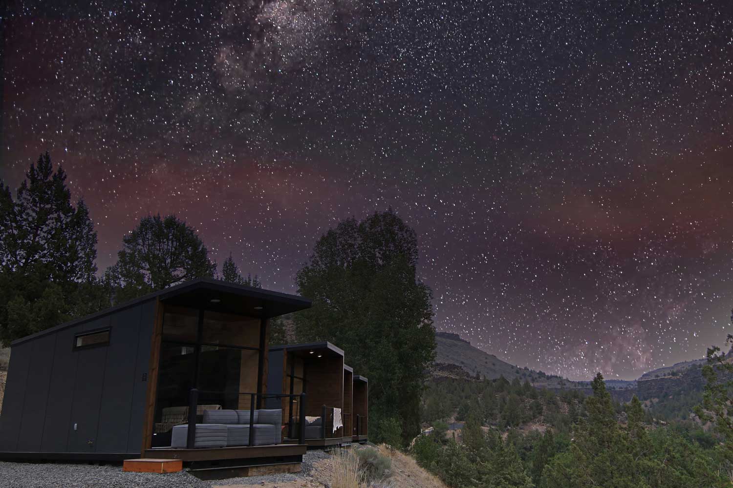 A tiny house community under the desert night sky