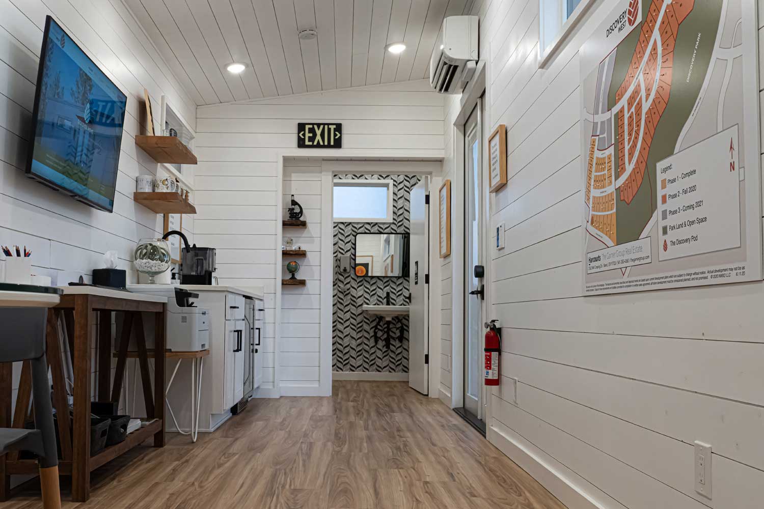 Interior of a custom tiny home used for a tiny house real estate office