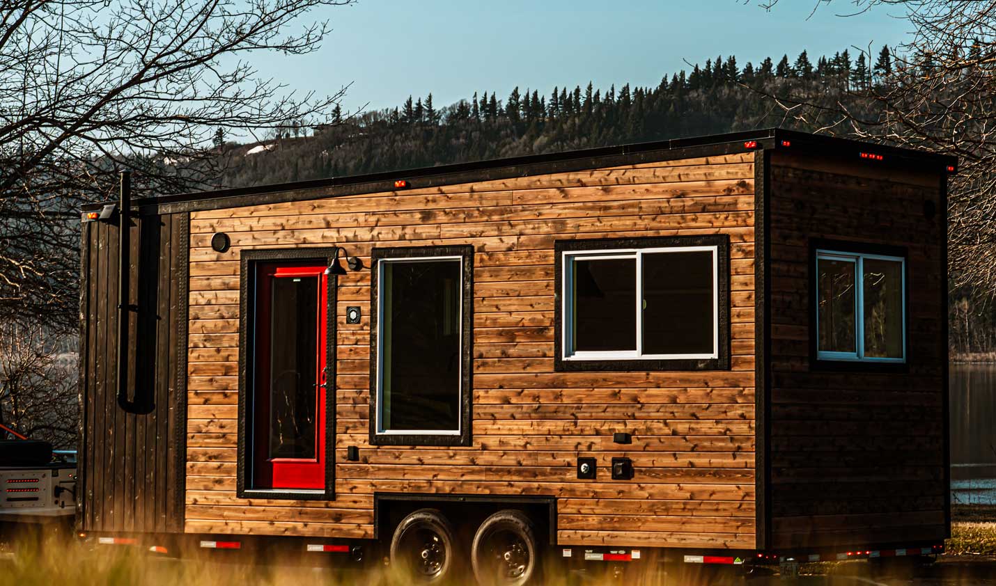 Legacy tiny house outside view in modern style with wood siding