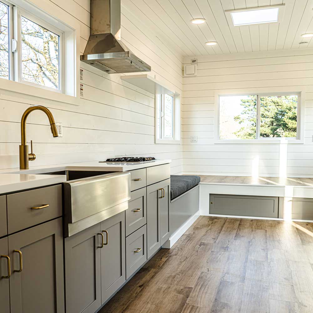Light, airy kitchen in the interior of a Legacy tiny house