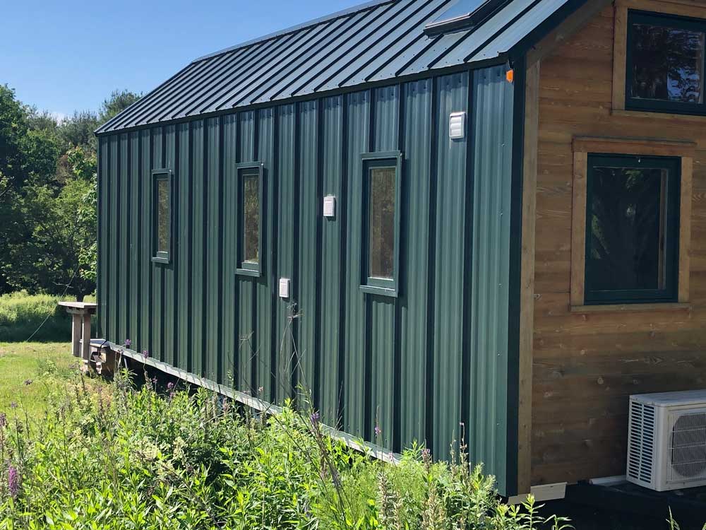 Outside siding on the Contemporary Cottage custom tiny home