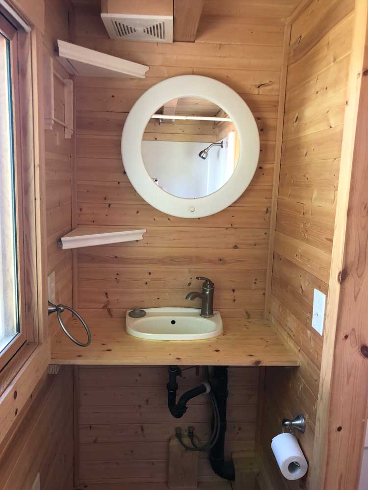 Bathroom sink of the Contemporary Cottage custom tiny home